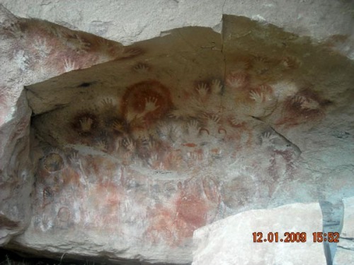 photo of cave of painted hands