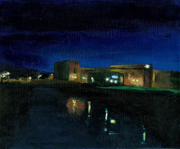 paintings of buildings and streets at night