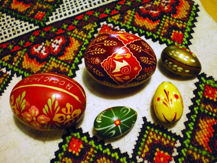 photo of pysanky on traditional cross-stitch cloth