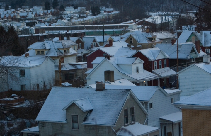 snow-covered houses at dusk
