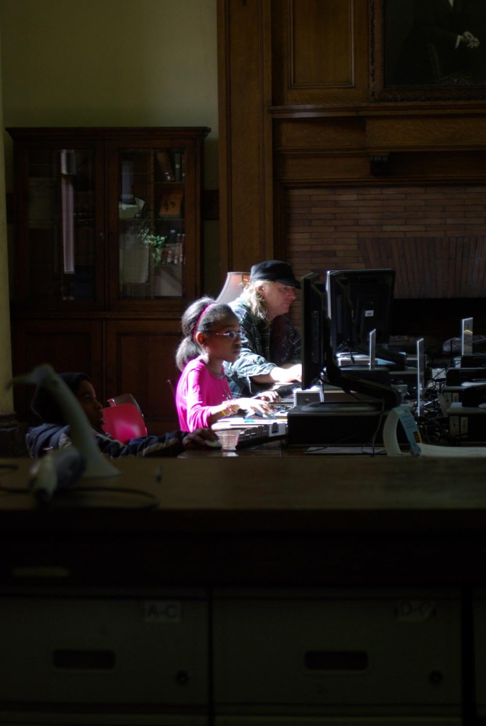 two people using a computer 