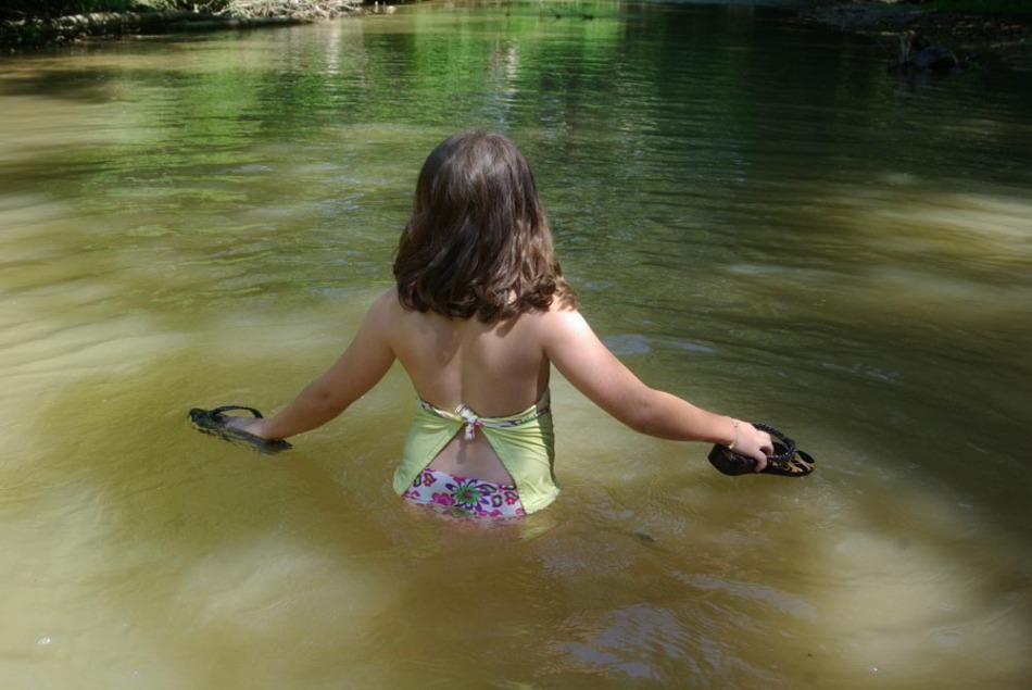 girl in stream water
