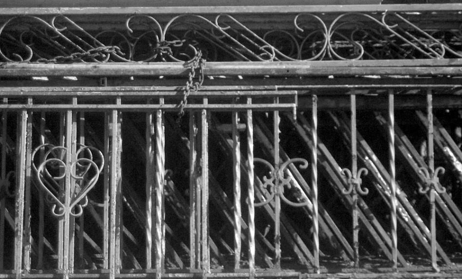 black and white photo of pile of wrought iron