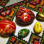 photo of pysanky on traditional cross-stitch cloth