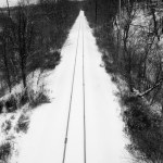 railroad tracks in the snow.