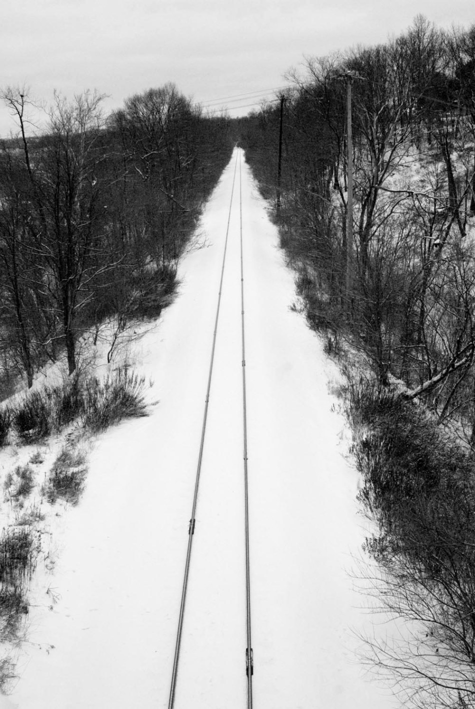 railroad tracks in the snow.